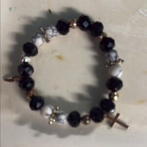 Black and White Beaded Bracelet with Silver Cross Charm